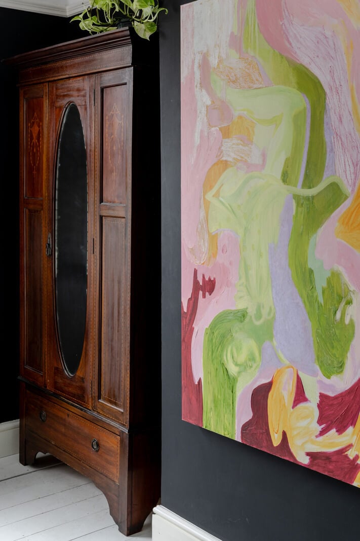 A Contrasting Color Palette in a Renovated Terrace House 12 black and white bedroom antique wardrobe