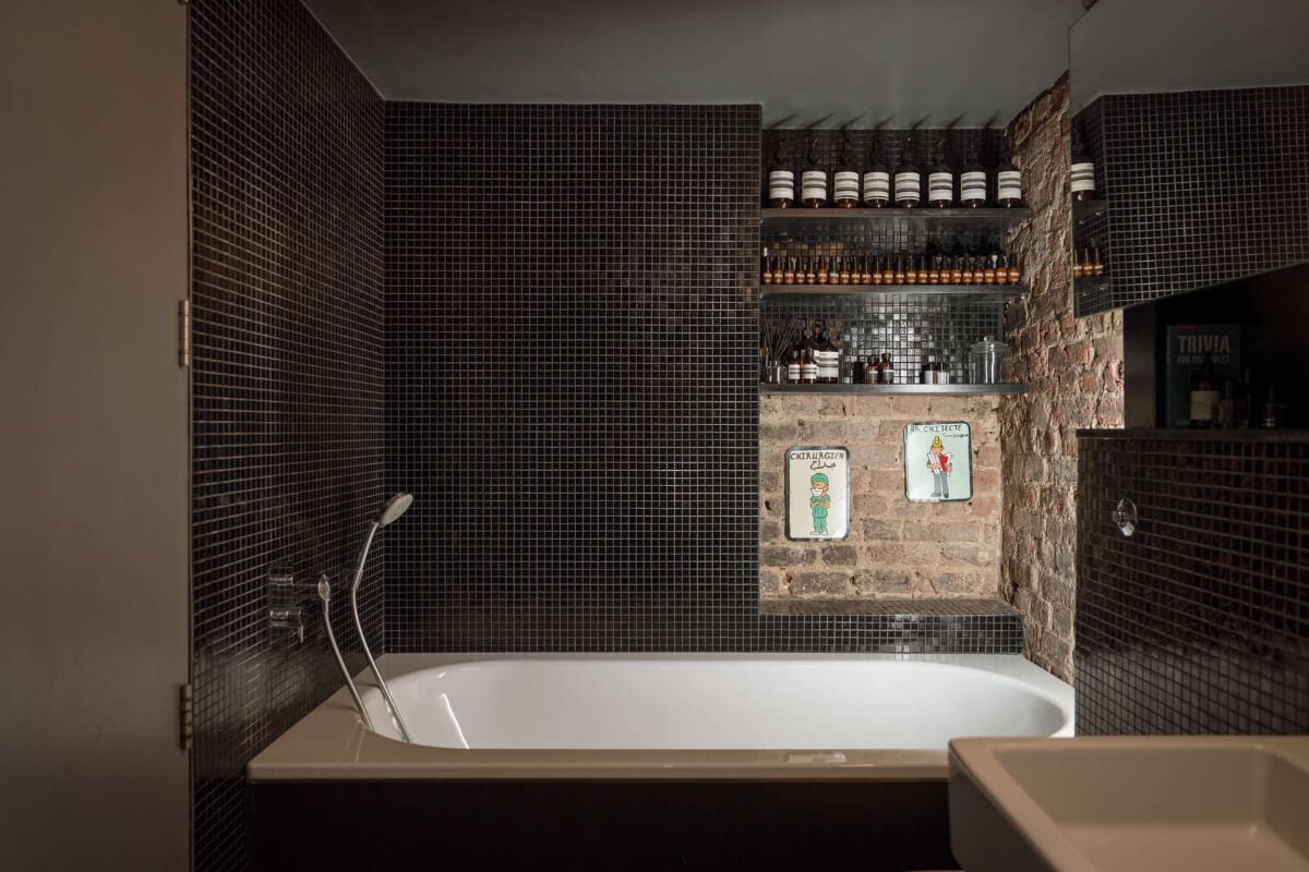A London Basement Apartment in a Former Wood Workshop 20 black bathroom exposed brickwork