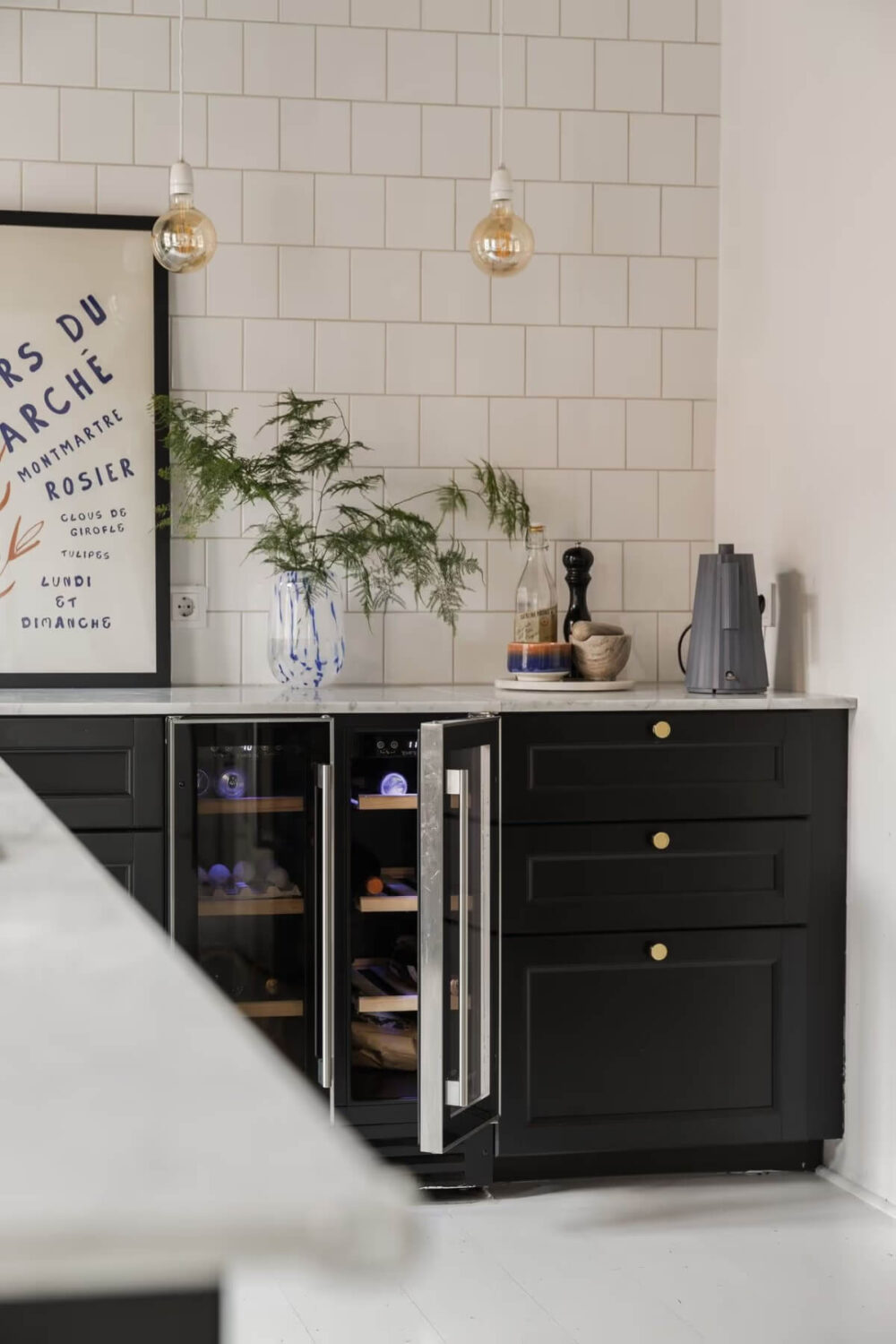 Grand Rooms and Period Features in a Malmö Apartment 14 black kitchen cabinets