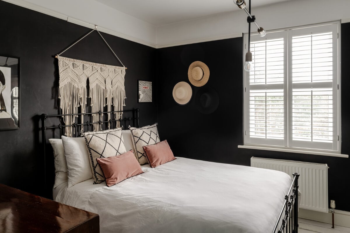 A Contrasting Color Palette in a Renovated Terrace House 11 black painted bedroom