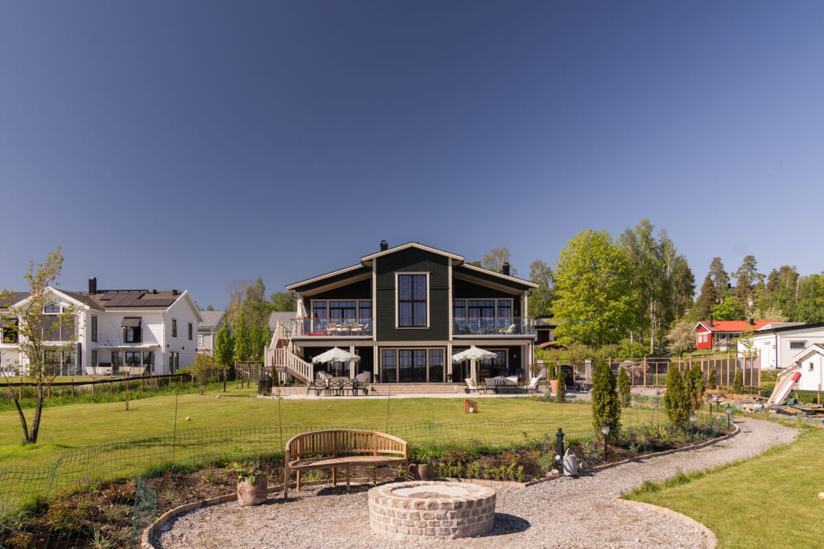 English Manor Style Interiors in a New Swedish Home with Lake Views 27 black swedish home garden