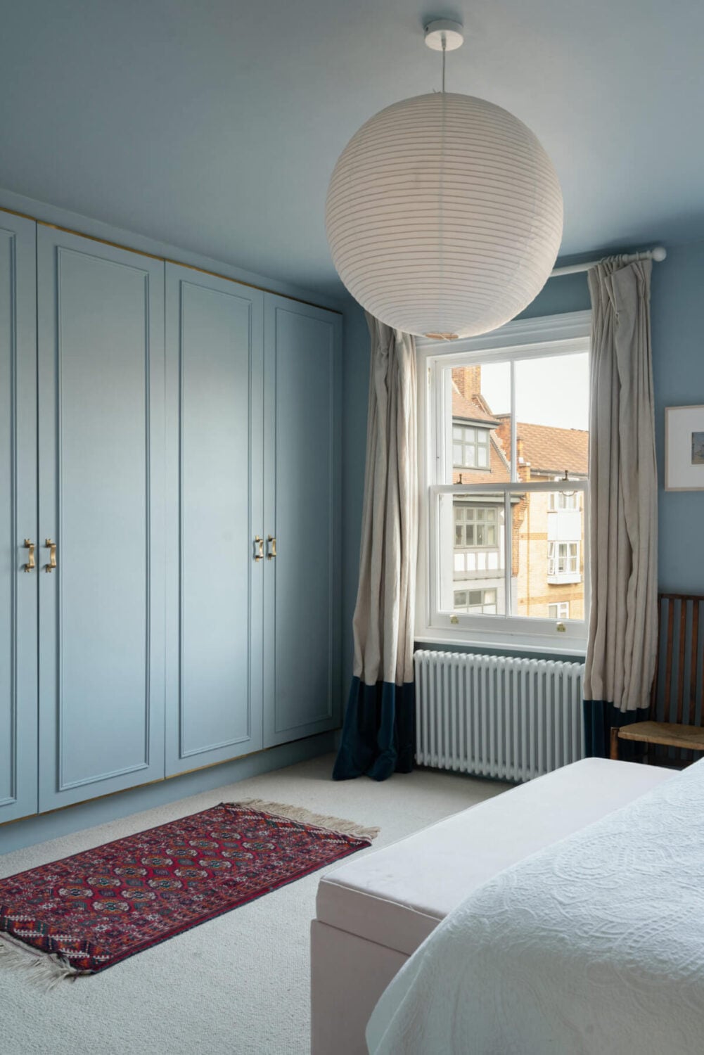 A Bright Victorian House with Plaster Walls and Blue Rooms 15 blue bedroom built-in wardrobes