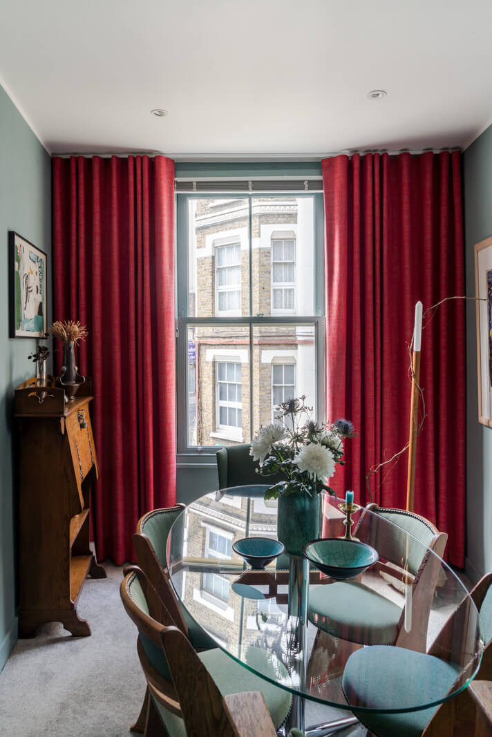 A Narrow Five-Story House with a Roof Garden in London's Clerkenwell 14 blue-green dining room glass table