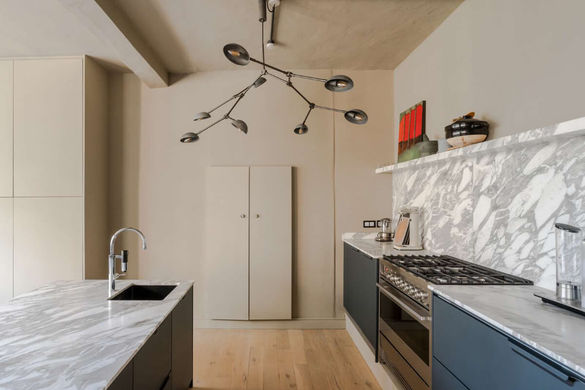 Soft-Colored Contemporary Interiors in a Warehouse Apartment 12 blue kitchen 1 Soft-Colored Contemporary Interiors in a Warehouse Apartment
