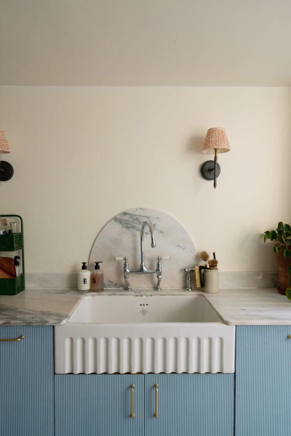 A Bright Victorian House with Plaster Walls and Blue Rooms 9 blue kitchen marble countertop