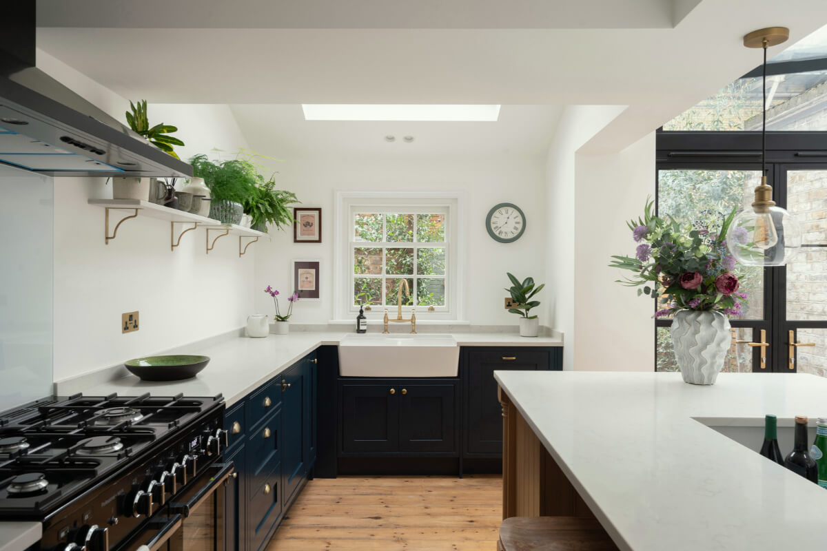 A Renovated Georgian House with an Extended Kitchen 6 blue kitchen with skylight