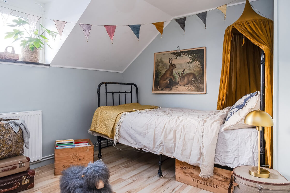 A Charming Duplex Apartment with a Stunning Kitchen 14 childrens room ochre canopy