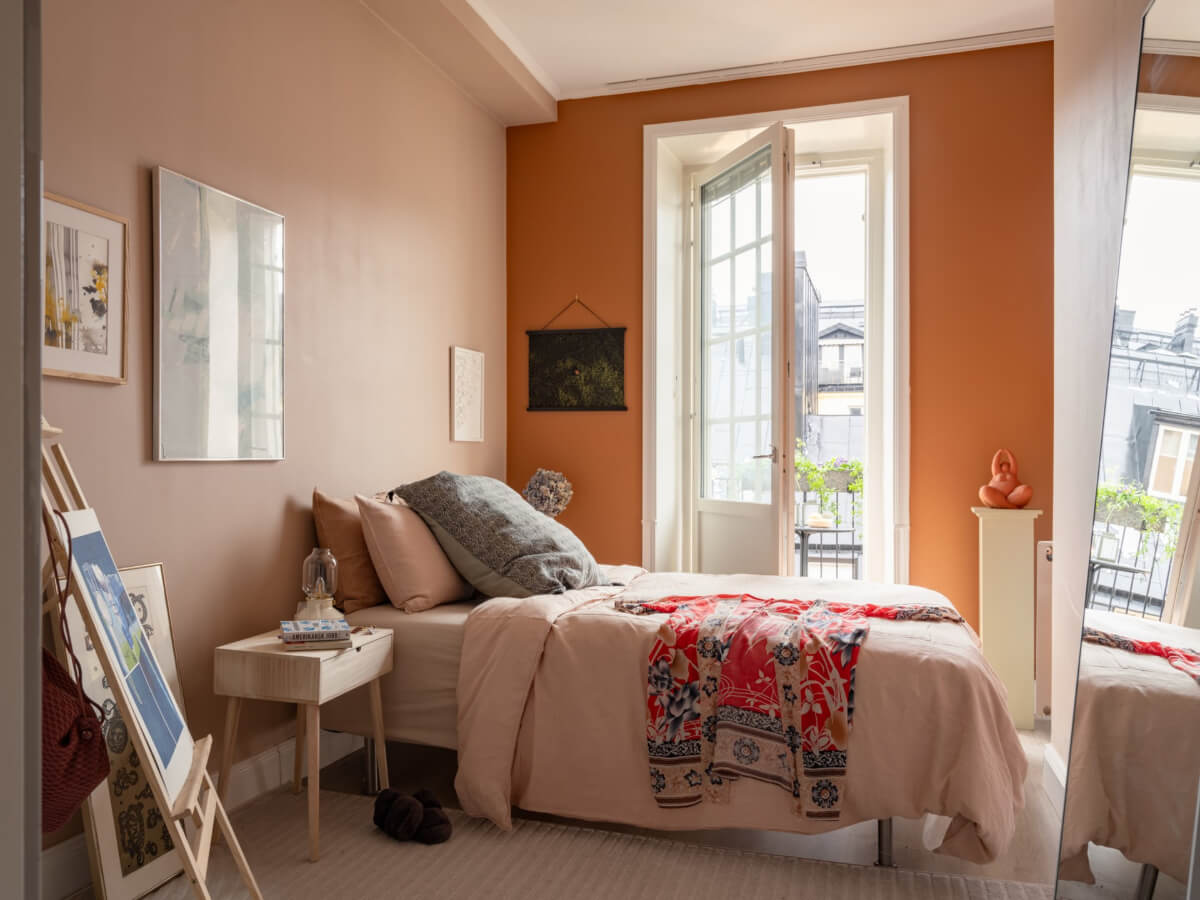 A Pink and Orange Bedroom in a Light Stockholm Apartment 20 colorful bedroom balcony