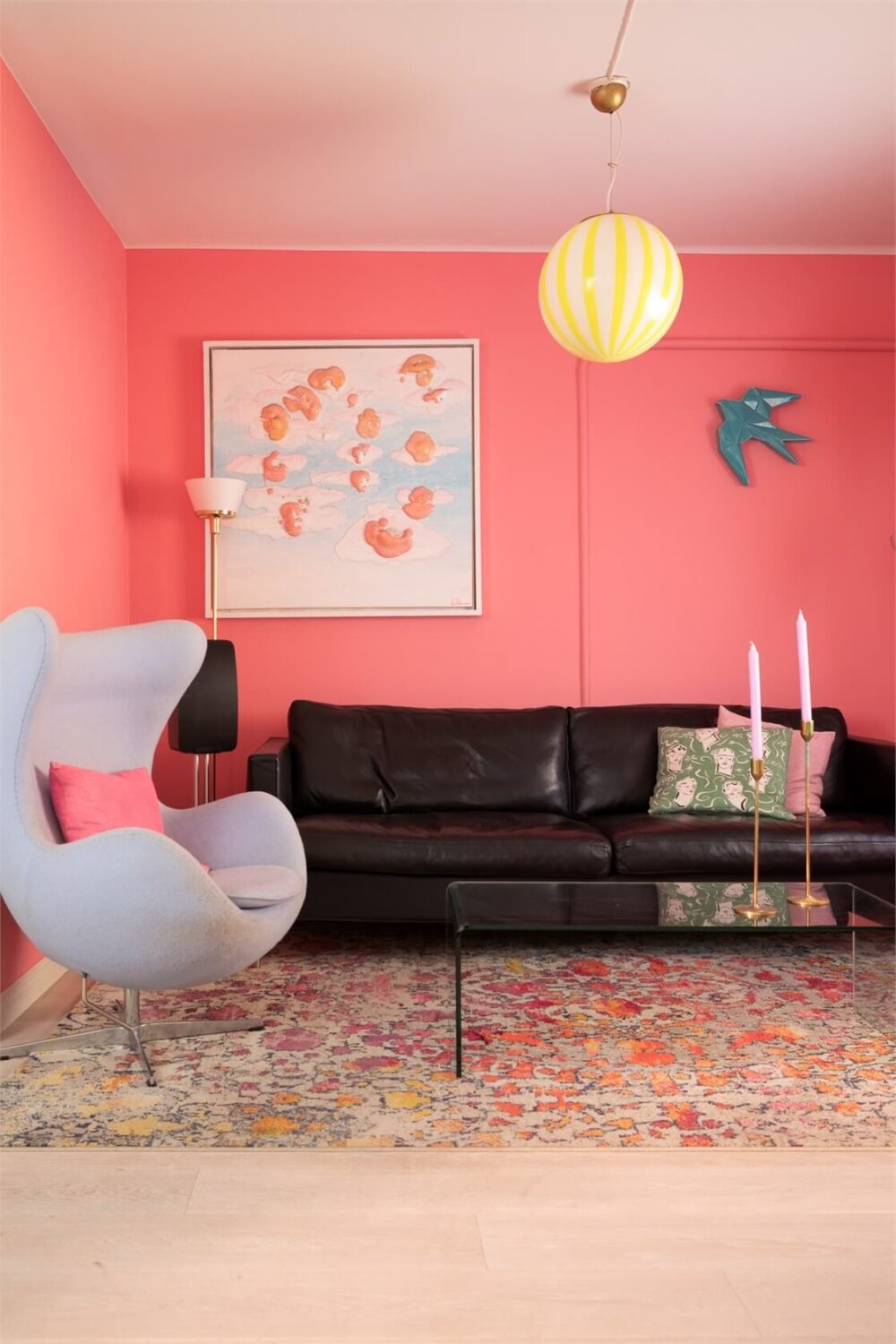 A Colorful Basement Duplex Apartment in Stockholm 3 colorful living room coral pink walls
