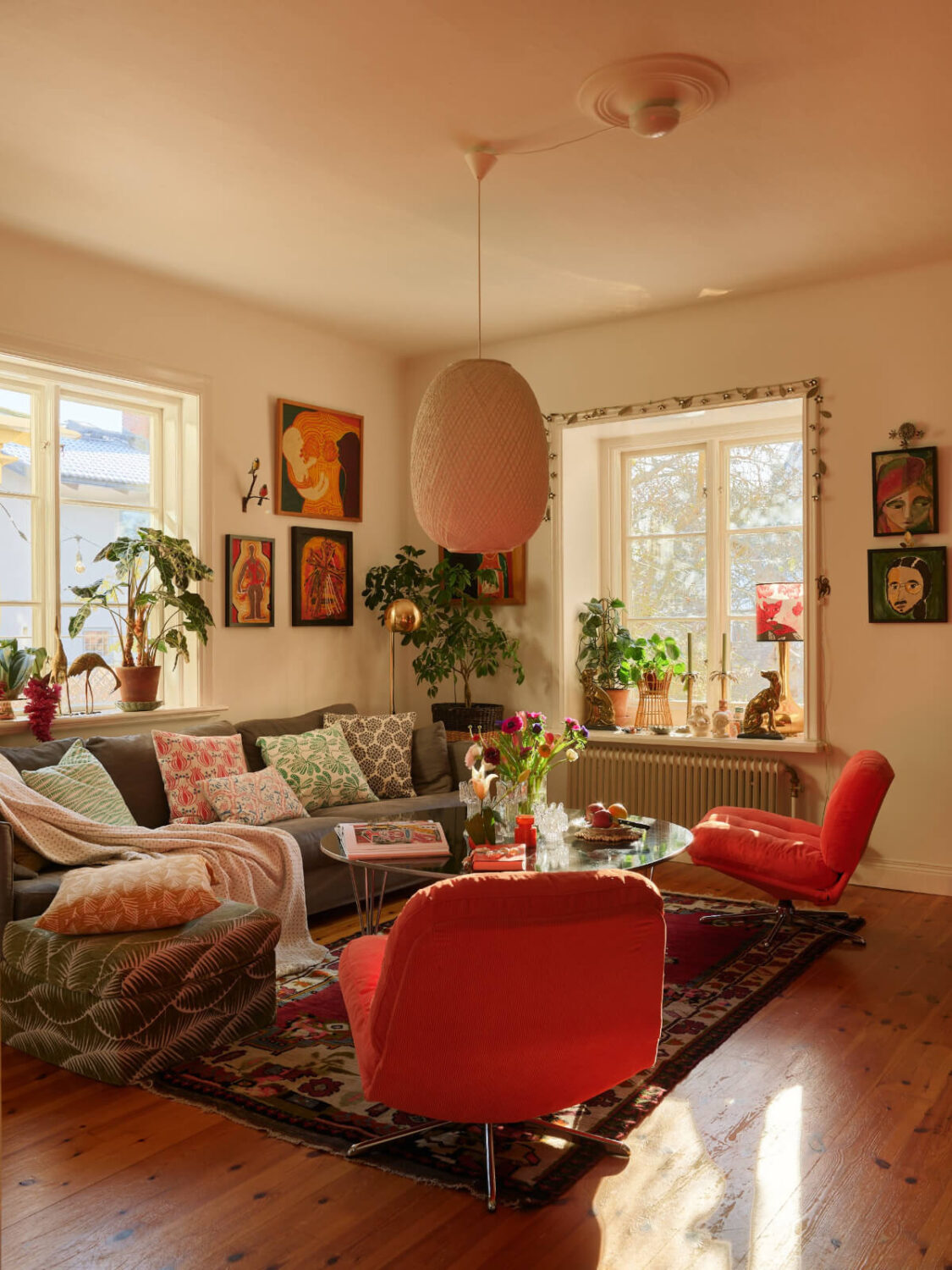 Colorful Interiors in a Wonderful Early 20th Century Swedish Villa 13 colorful living room wooden floor textiles