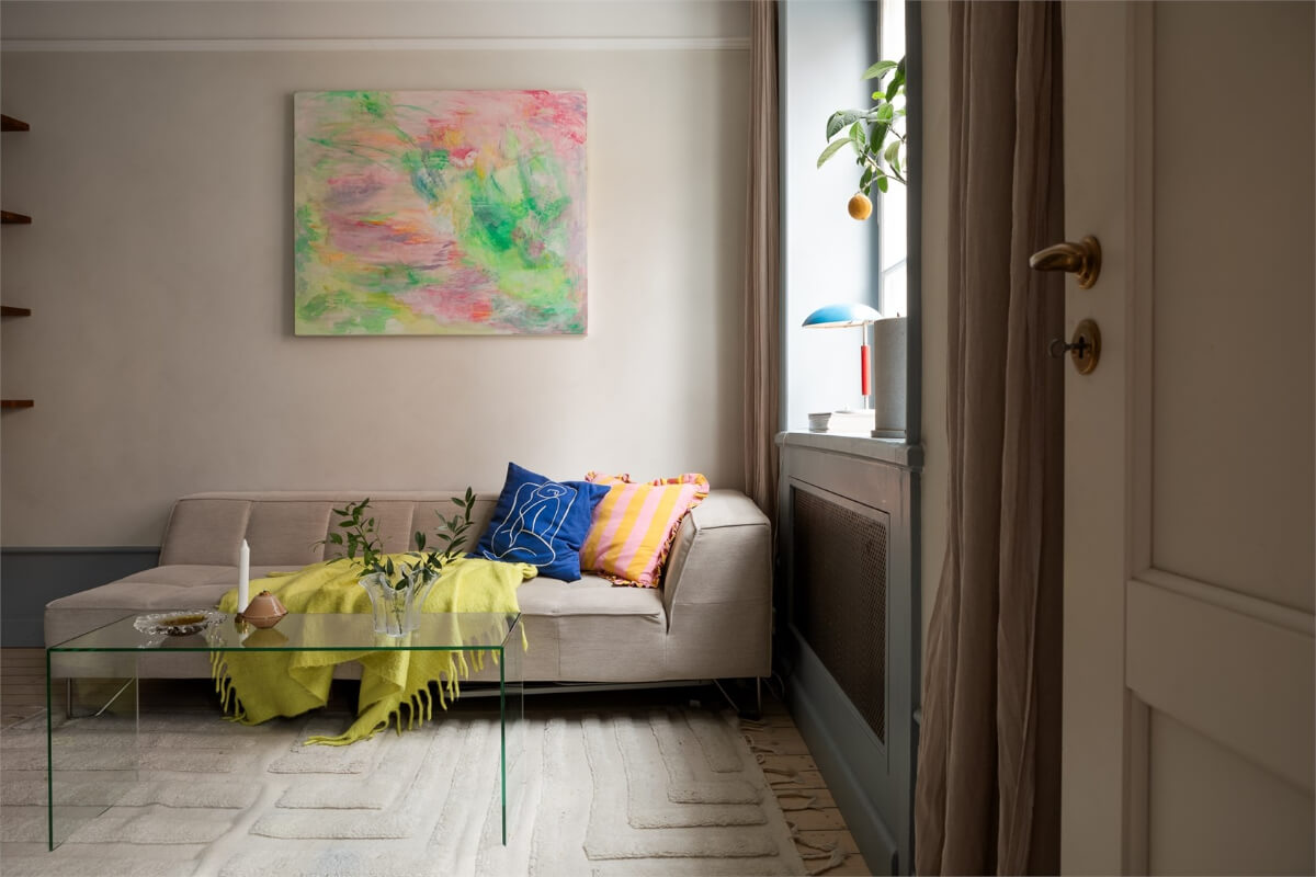 A Small Stockholm Apartment with a Blue Shaker Kitchen 3 contemporary living room clear coffee table