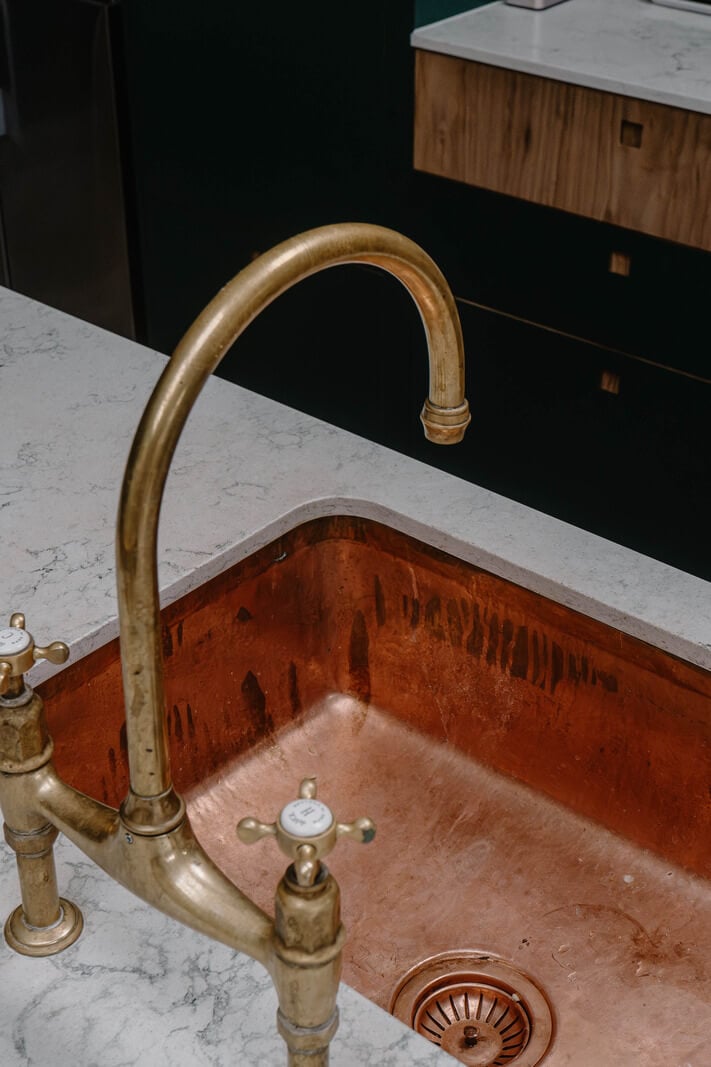 Moroccan-Inspired Designs in a Unique Artist Family Home in London 10 copper sink