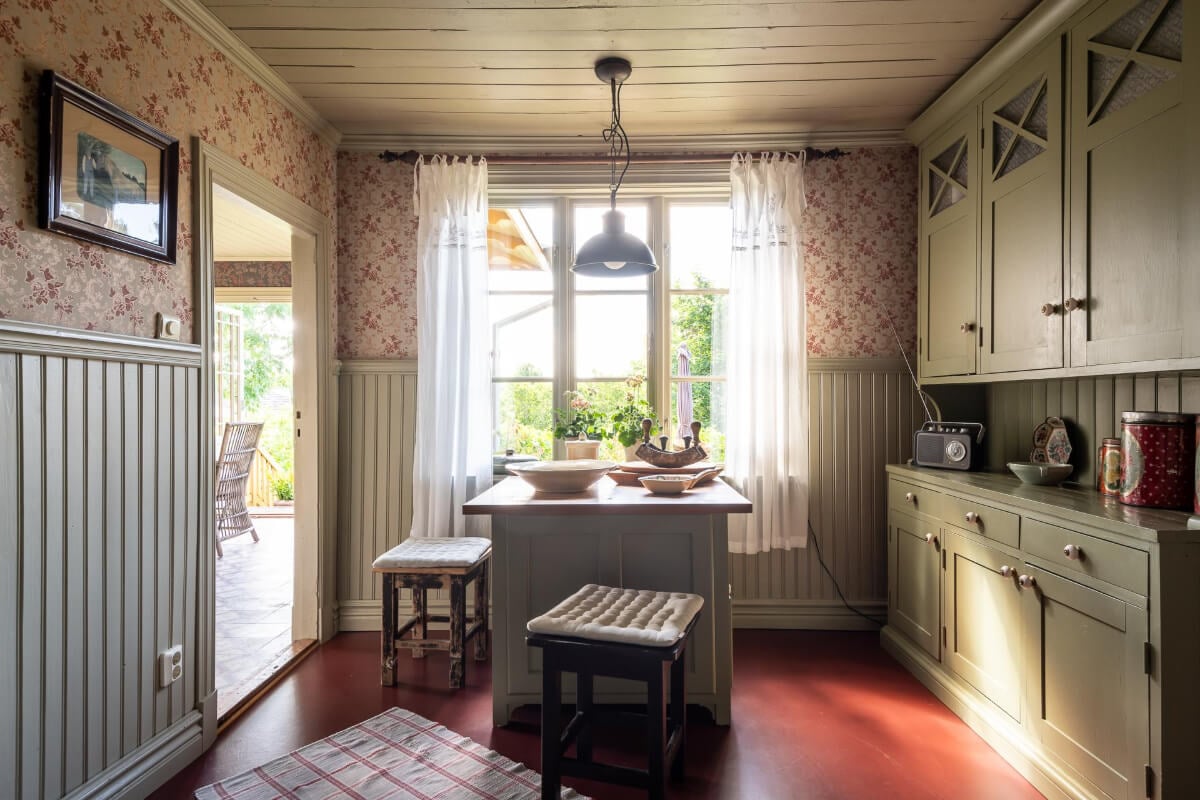 A Beautiful Historic Swedish Country House with Wallpapers 11 country house kitchen tongue and groove paneling wallpaper