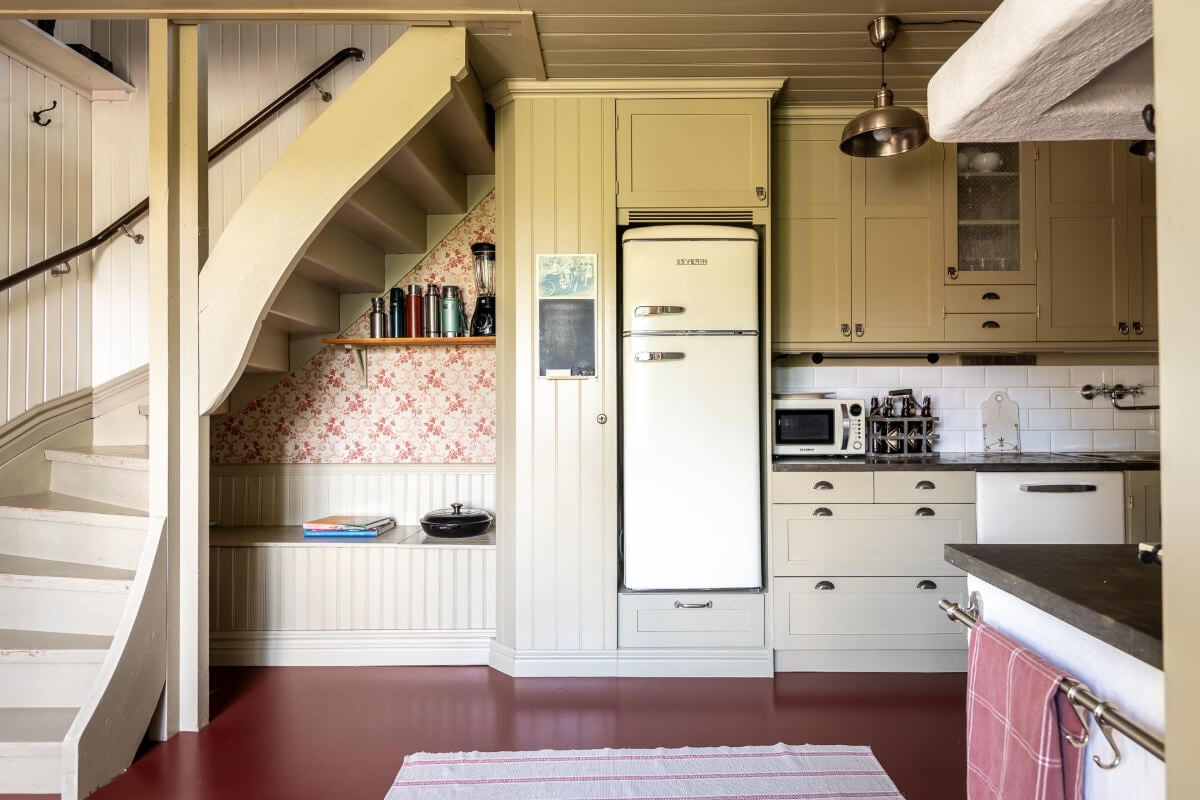 A Beautiful Historic Swedish Country House with Wallpapers 9 country kitchen raised fridge bench
