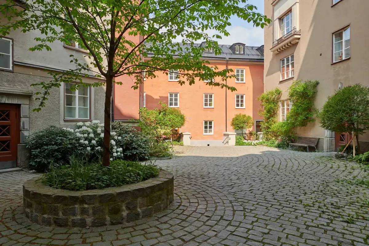 A Colorful Studio Apartment in Stockholm 15 courtyard cobblestones