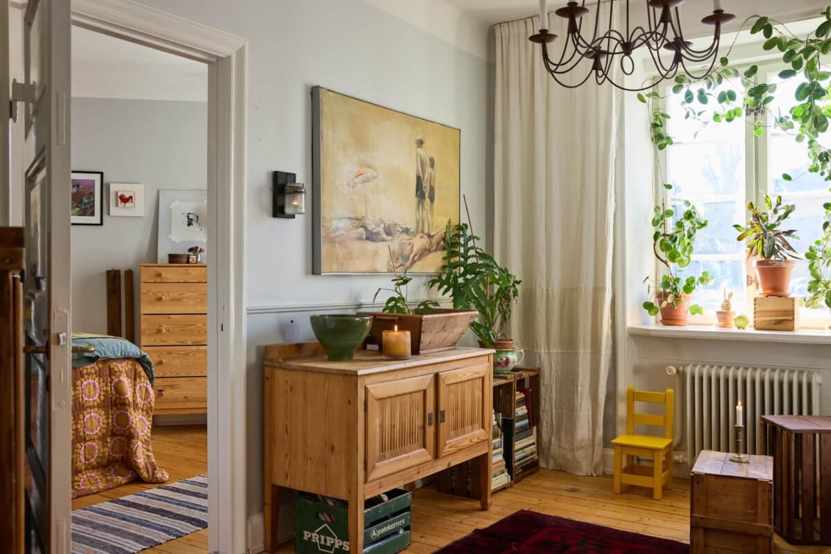 A Charming Apartment with Period Details in Malmö 2 cozy light gray living room wooden floor
