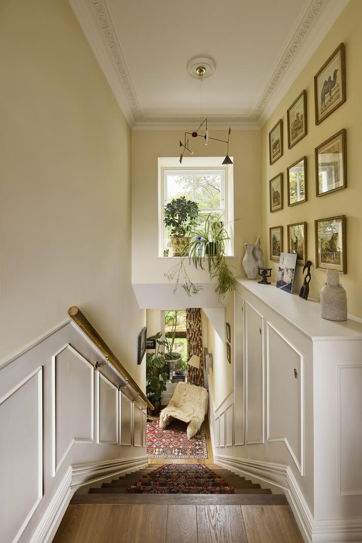 A Renovated Early Victorian Townhouse Decorated in Green Tones 19 dark beige staircase