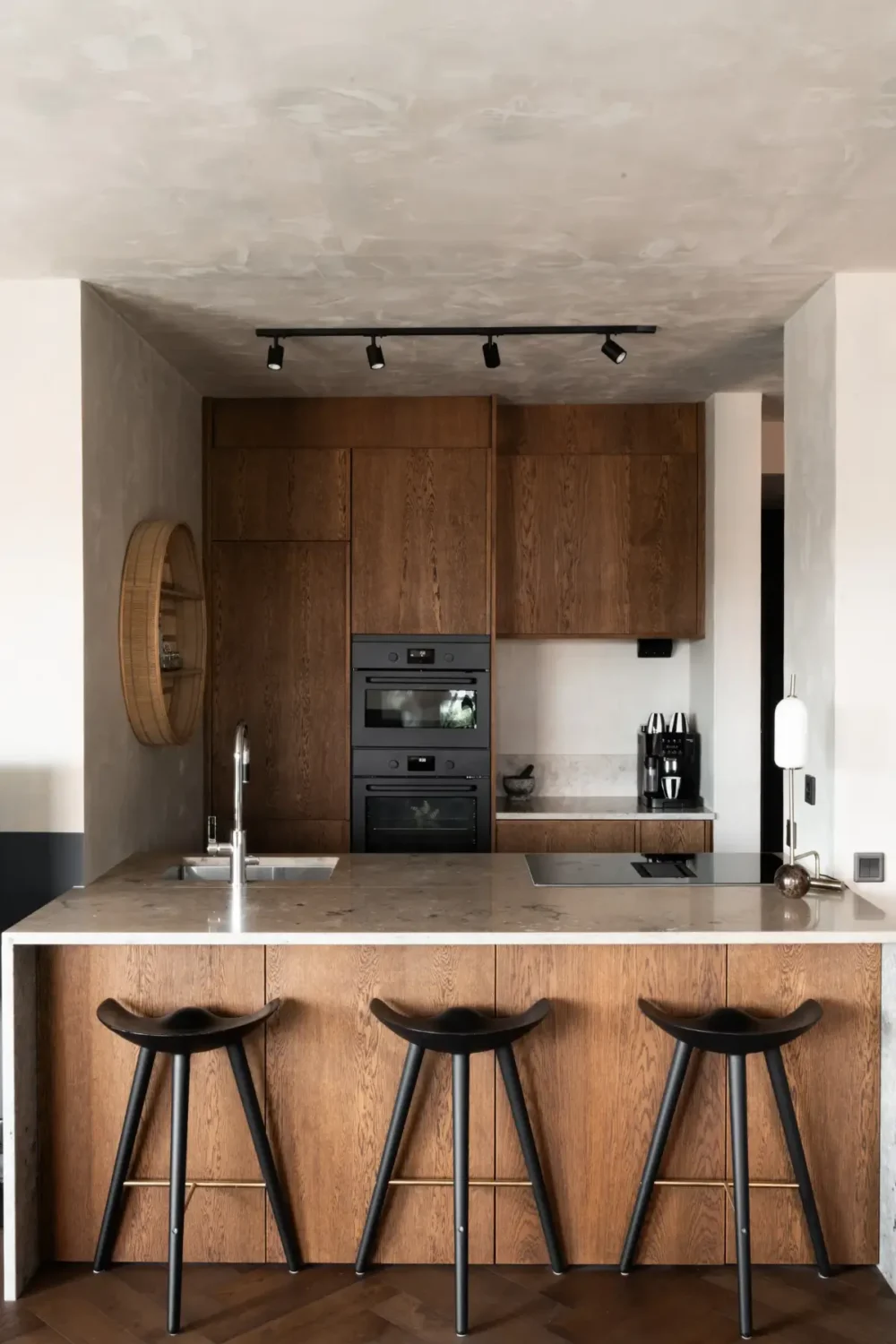 A Top Floor Swedish Apartment with a Huge Balcony 12 dark oak kitchen with breakfast bar