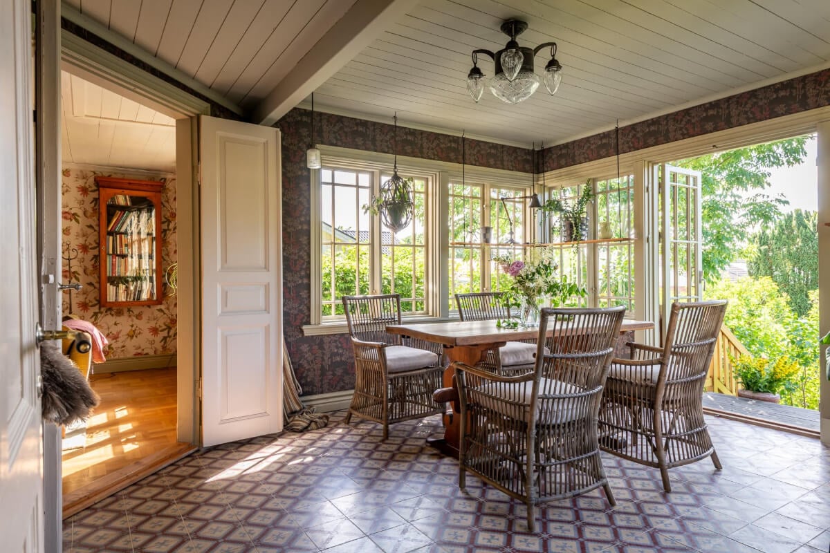 A Beautiful Historic Swedish Country House with Wallpapers 12 dining room tile floor glass doors to garden