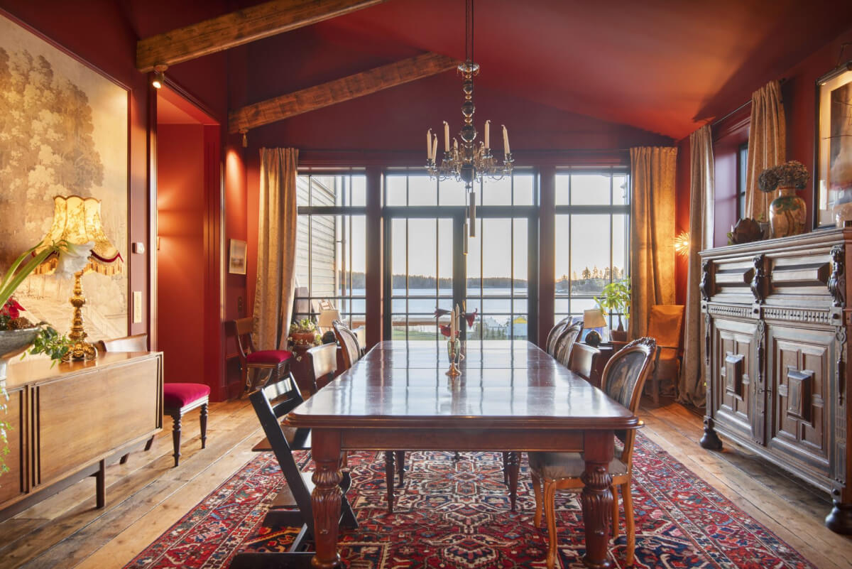 English Manor Style Interiors in a New Swedish Home with Lake Views 9 dining room with pitched ceiling