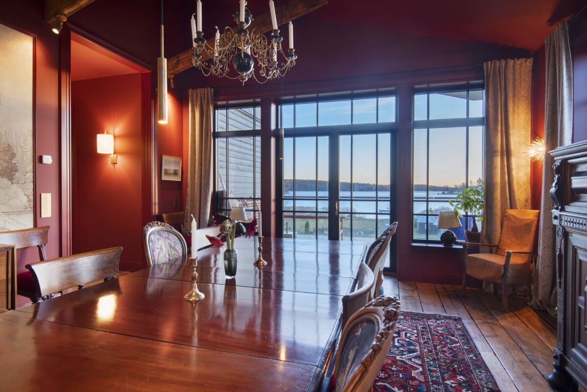 English Manor Style Interiors in a New Swedish Home with Lake Views 8 dining room with sea views