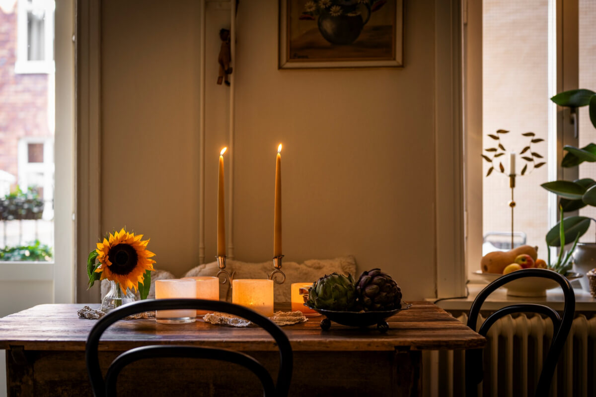 A Cozy Small Apartment with Period Features and Lots of Storage 8 dining table at night
