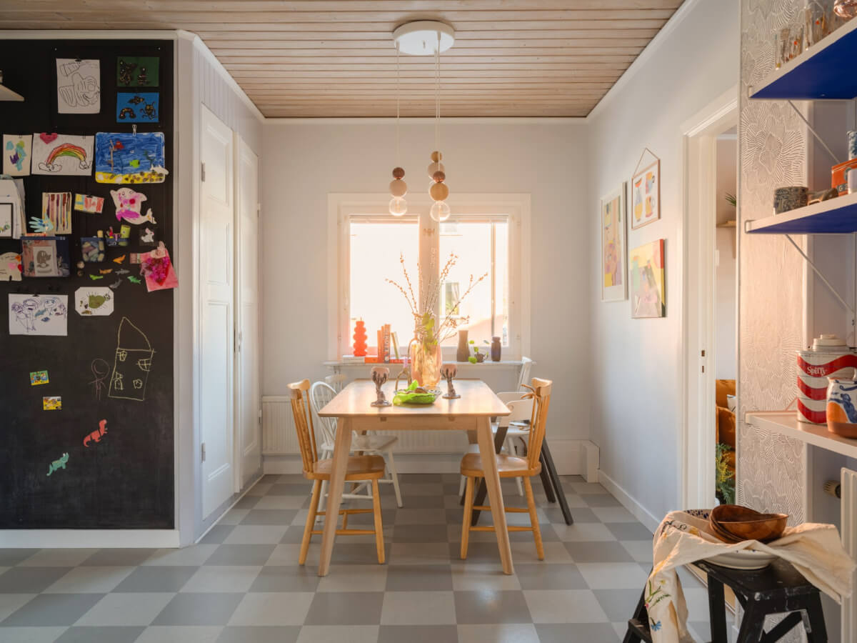 Colorful Decor in a Charming Family Duplex Apartment in Stockholm 15 dining table in kitchen