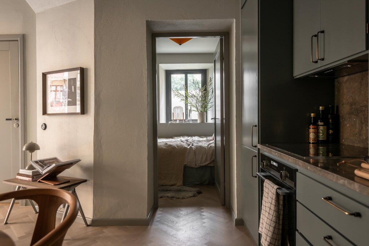 A Small Ground Floor Apartment Decorated in Gray Tones 11 doorway to bedroom