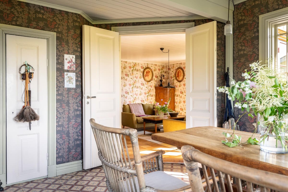 A Beautiful Historic Swedish Country House with Wallpapers 18 double doors into living room