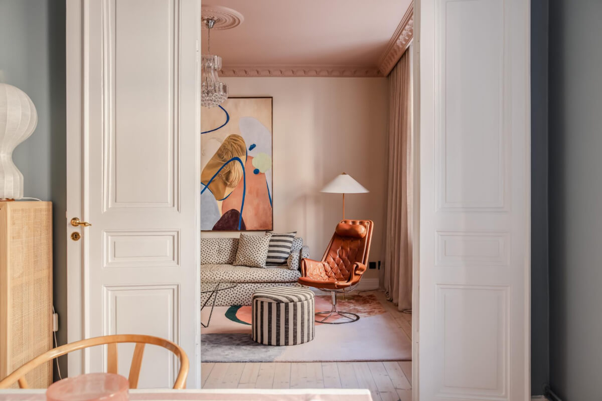 Pastel Colors and Contemporary Design in a Late 19th Century Apartment 8 double doors to pink living room