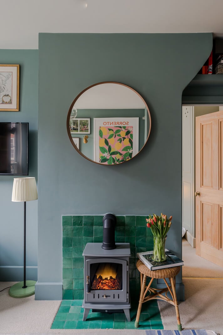 A Calm & Stylish Color Palette in a Small London Apartment 6 emerald green fireplace tiles