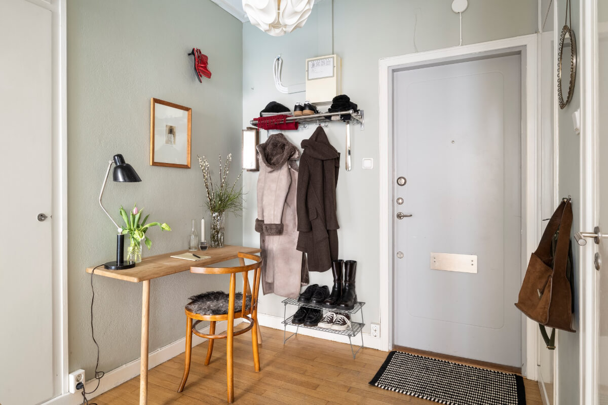 A Studio Apartment with Exposed Brick and Original Details 19 entry hall with desk A Studio Apartment with Exposed Brick and Original Details