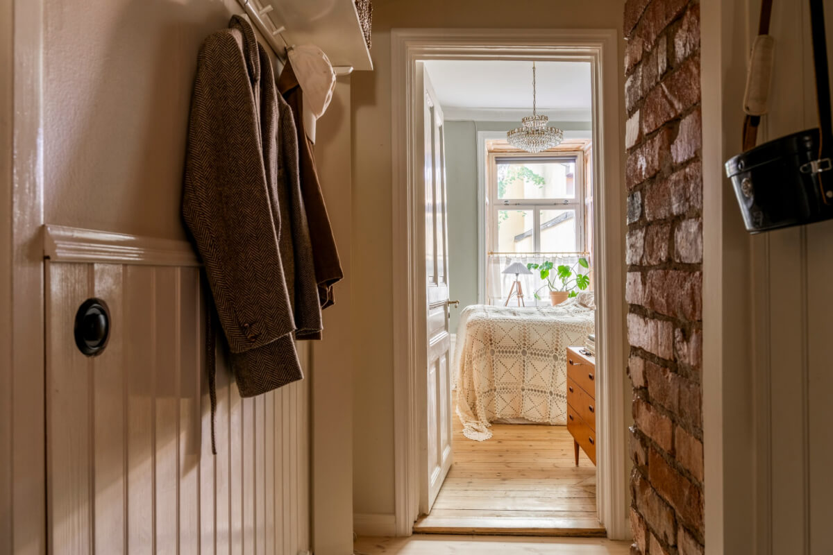 A Cozy Small Apartment with Period Features and Lots of Storage 17 exposed brick and wood paneling
