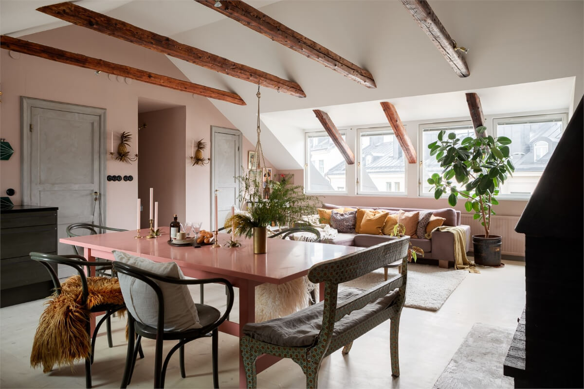 A Colorful Family Attic Apartment in Stockholm 10 exposed wooden beams living space