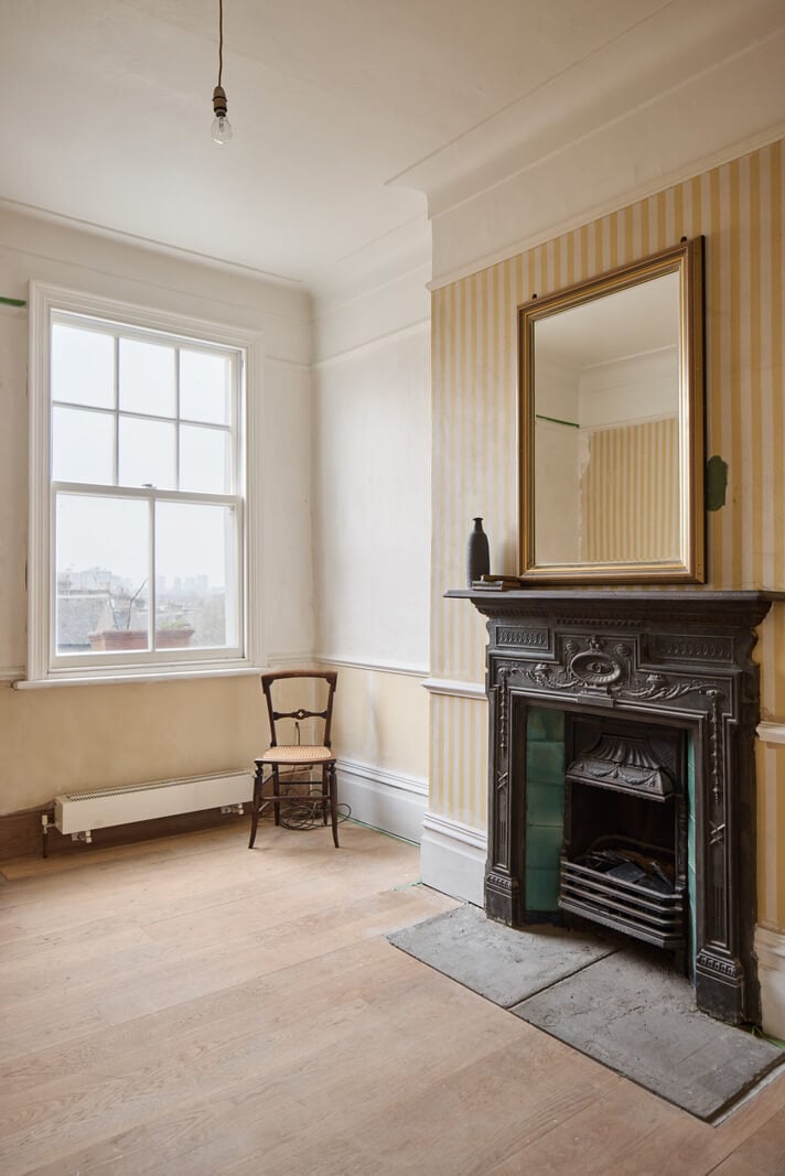 Grand Proportions and Period Details in a Victorian Villa 14 fireplace and striped wallpaper
