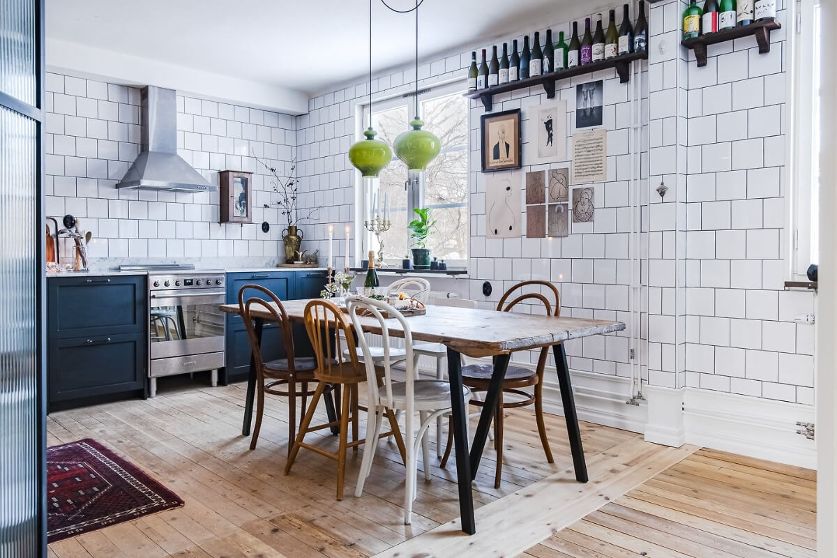 A Charming Duplex Apartment with a Stunning Kitchen 2 floor to ceiling white tilework kitchen