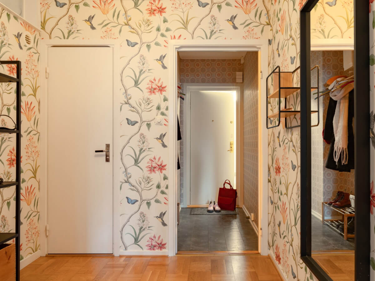 A Light Corner Apartment with a Pale Yellow Kitchen 24 floral bird wallpaper hall A Light Corner Apartment with a Pale Yellow Kitchen