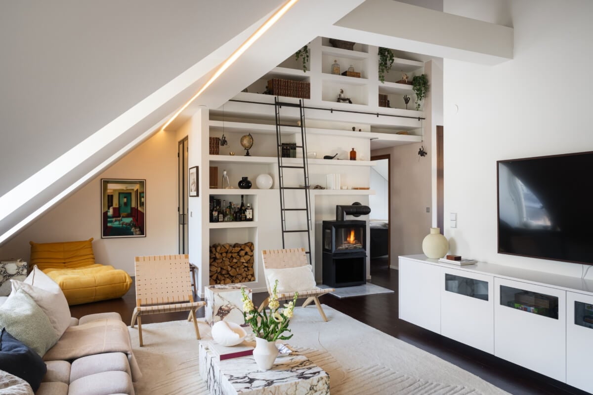 A Light Penthouse Apartment with Built-In Bookshelves 6 foor to ceiling built-in bookshelves penthouse apartment