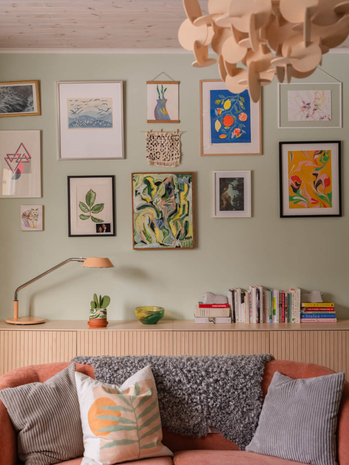 Colorful Decor in a Charming Family Duplex Apartment in Stockholm 5 gallery wall