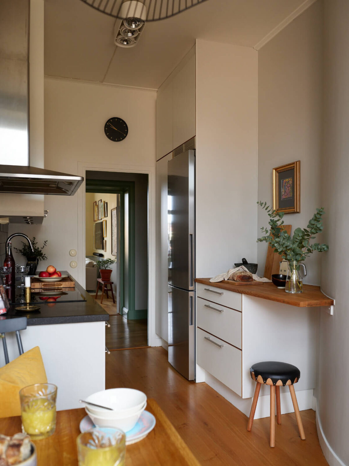 Lovely Color Combinations in a Charming One-Bedroom Apartment 15 galley kitchen
