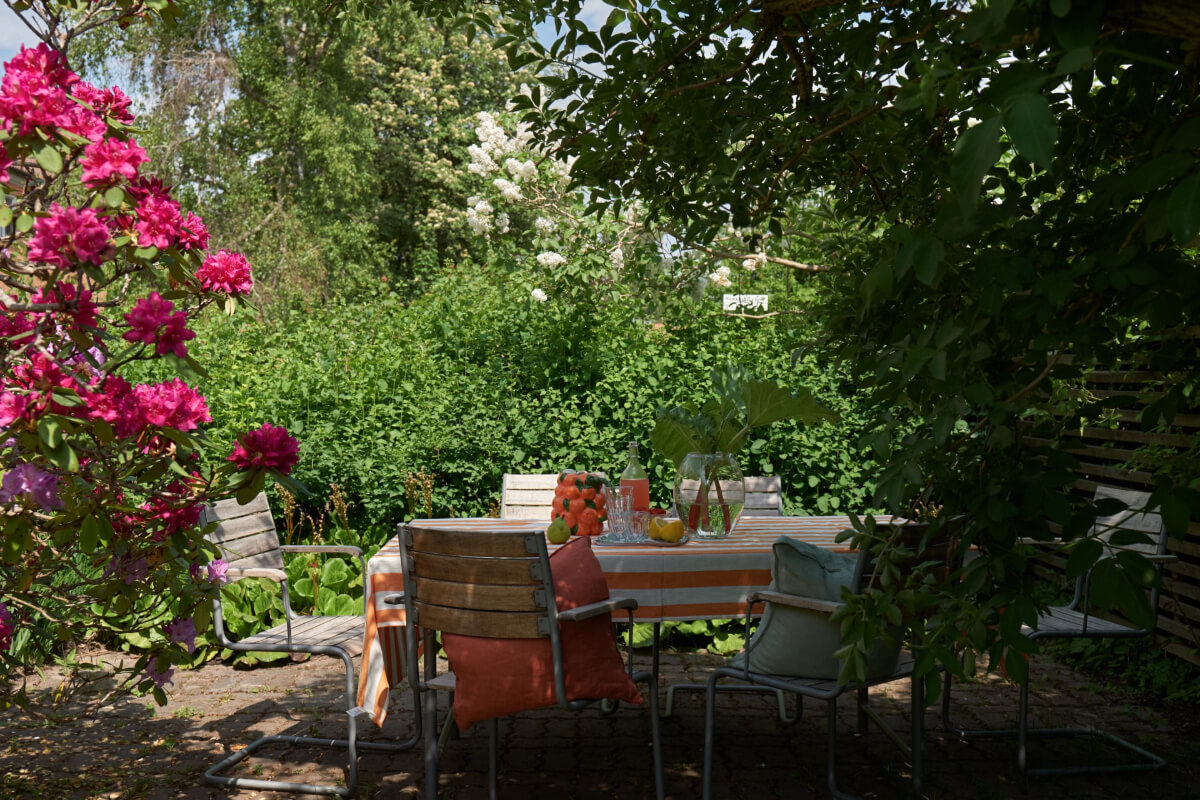 Colorful Decor in a Charming Family Duplex Apartment in Stockholm 36 garden seating 1 Colorful Decor in a Charming Family Duplex Apartment in Stockholm