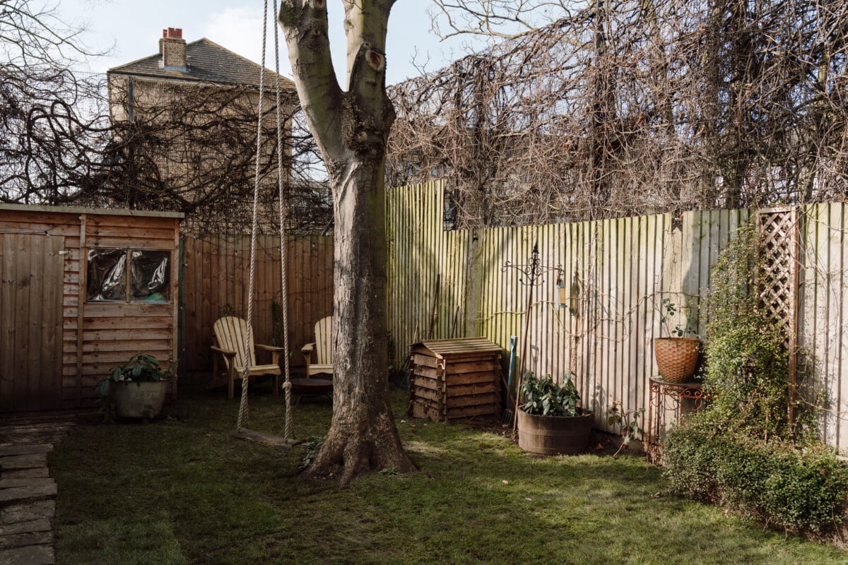 A Bright Victorian House with Plaster Walls and Blue Rooms 24 garden with swing on tree