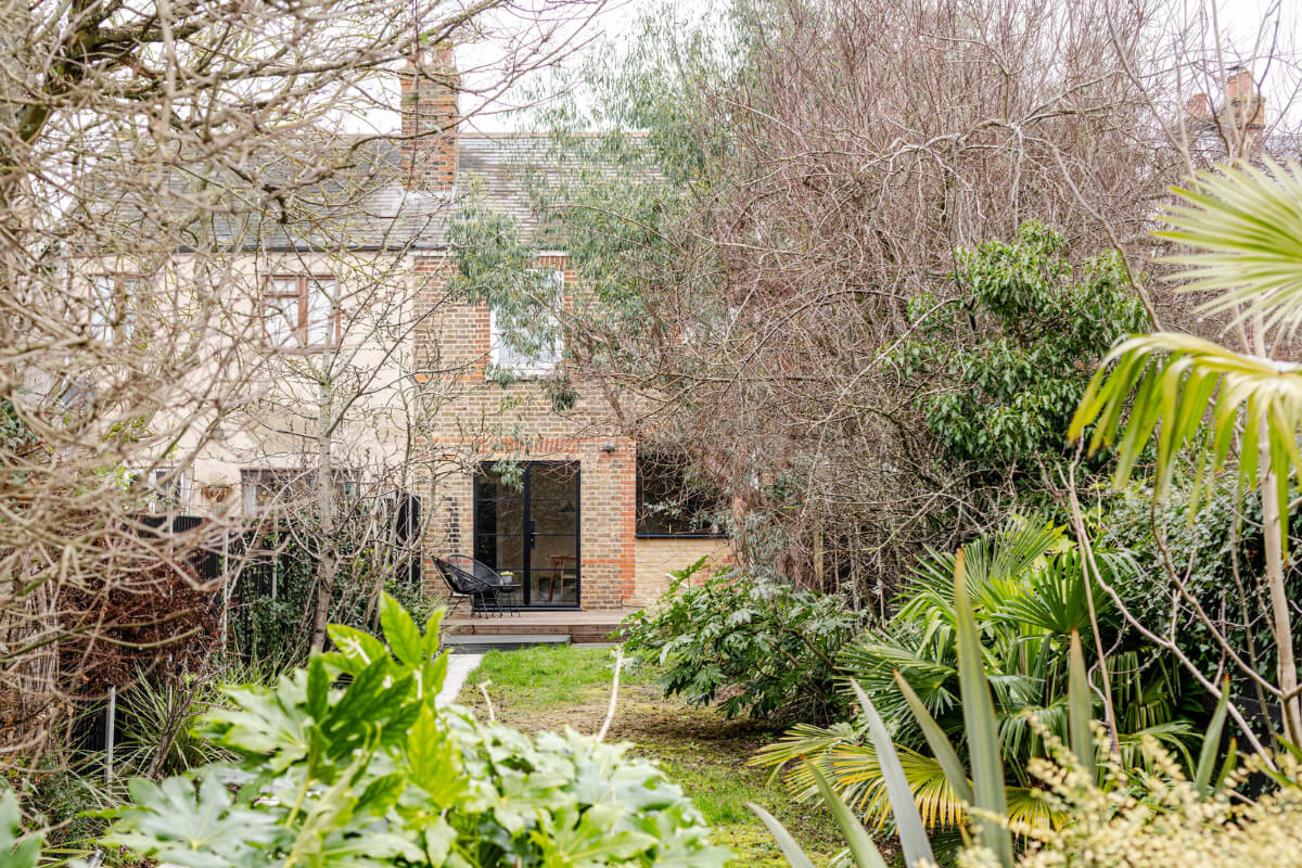 A Contrasting Color Palette in a Renovated Terrace House 20 garden A Contrasting Color Palette in a Renovated Terrace House
