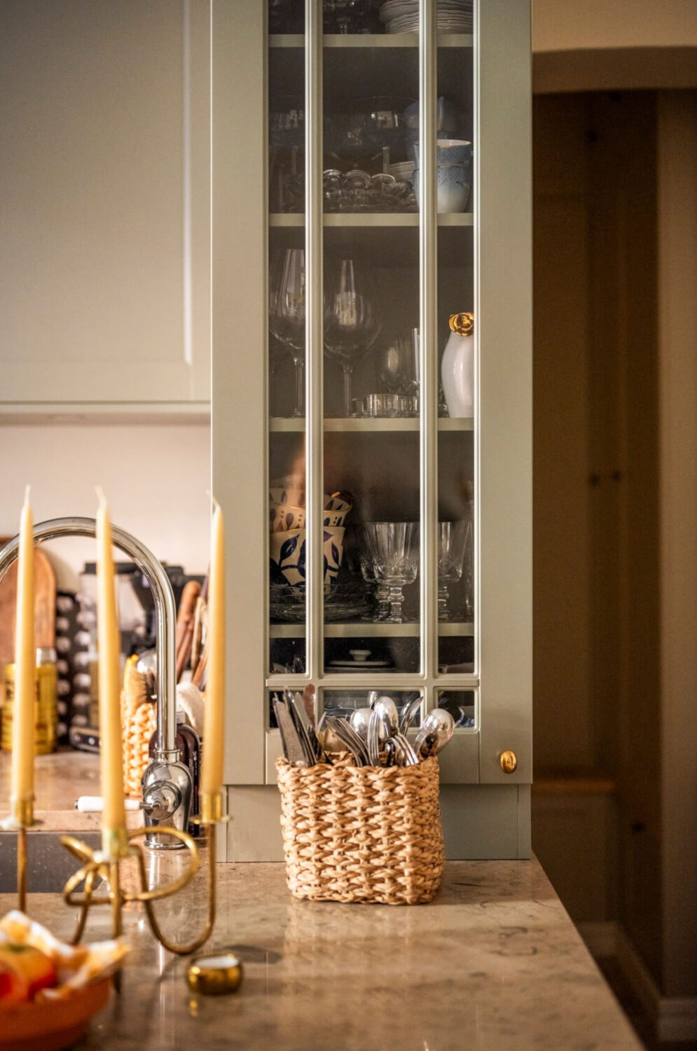 A Cozy Small Apartment with Period Features and Lots of Storage 12 glass fronted kitchen cabinet