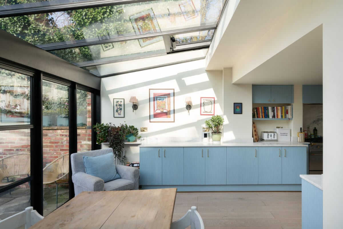 A Bright Victorian House with Plaster Walls and Blue Rooms 10 glass kitchen extension