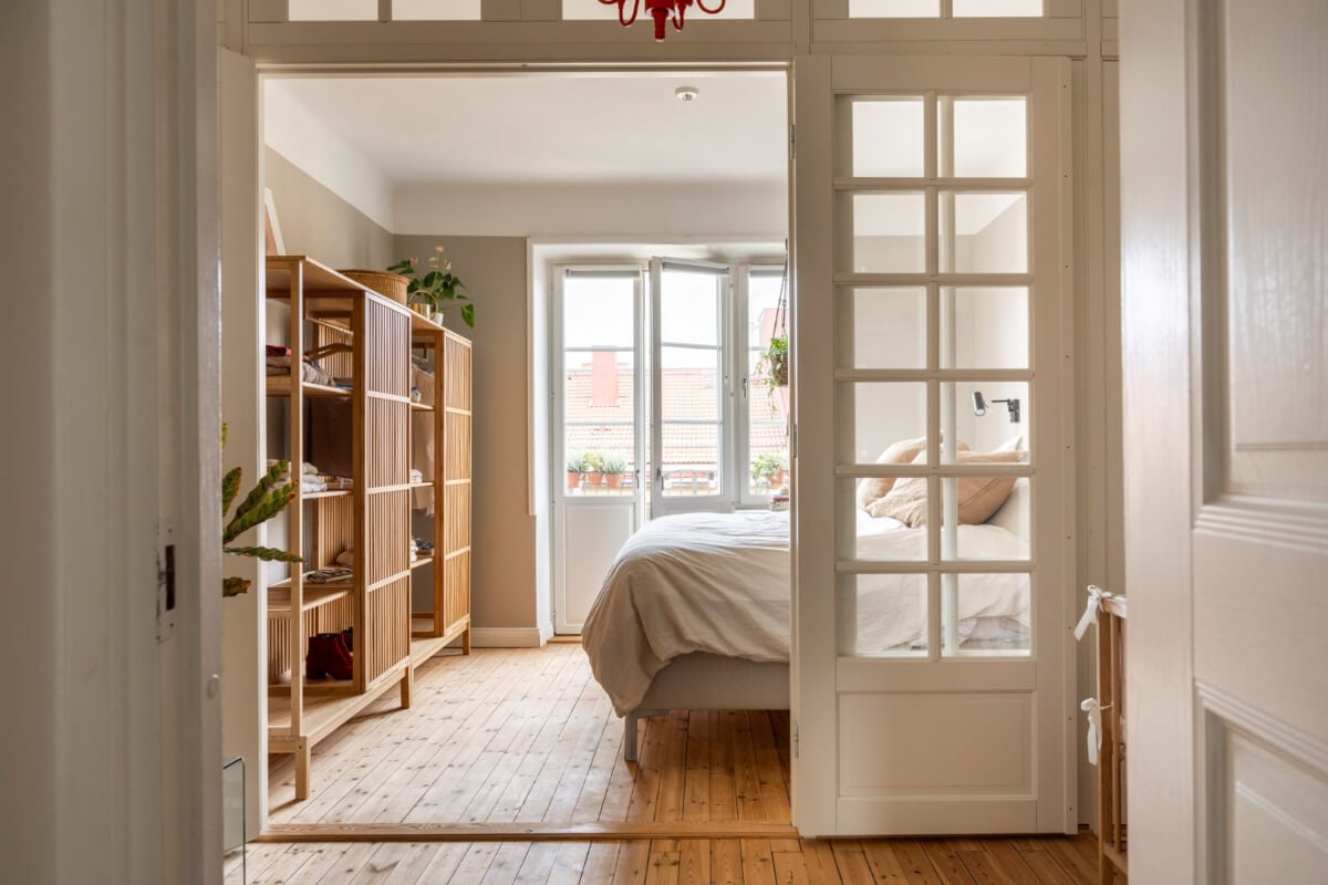 A Light Swedish Apartment with a Green Living Room 17 glass wooden room partition