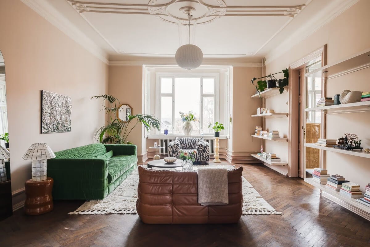 Grand Rooms and Period Features in a Malmö Apartment 1 grand living room parquet floor pink walls