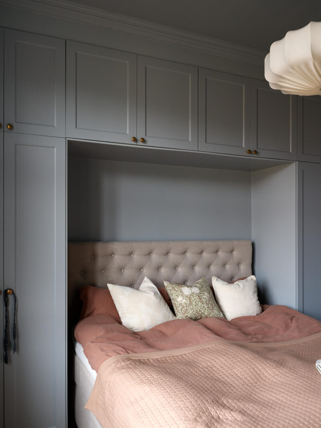Lovely Color Combinations in a Charming One-Bedroom Apartment 20 gray bedroom closets around bed