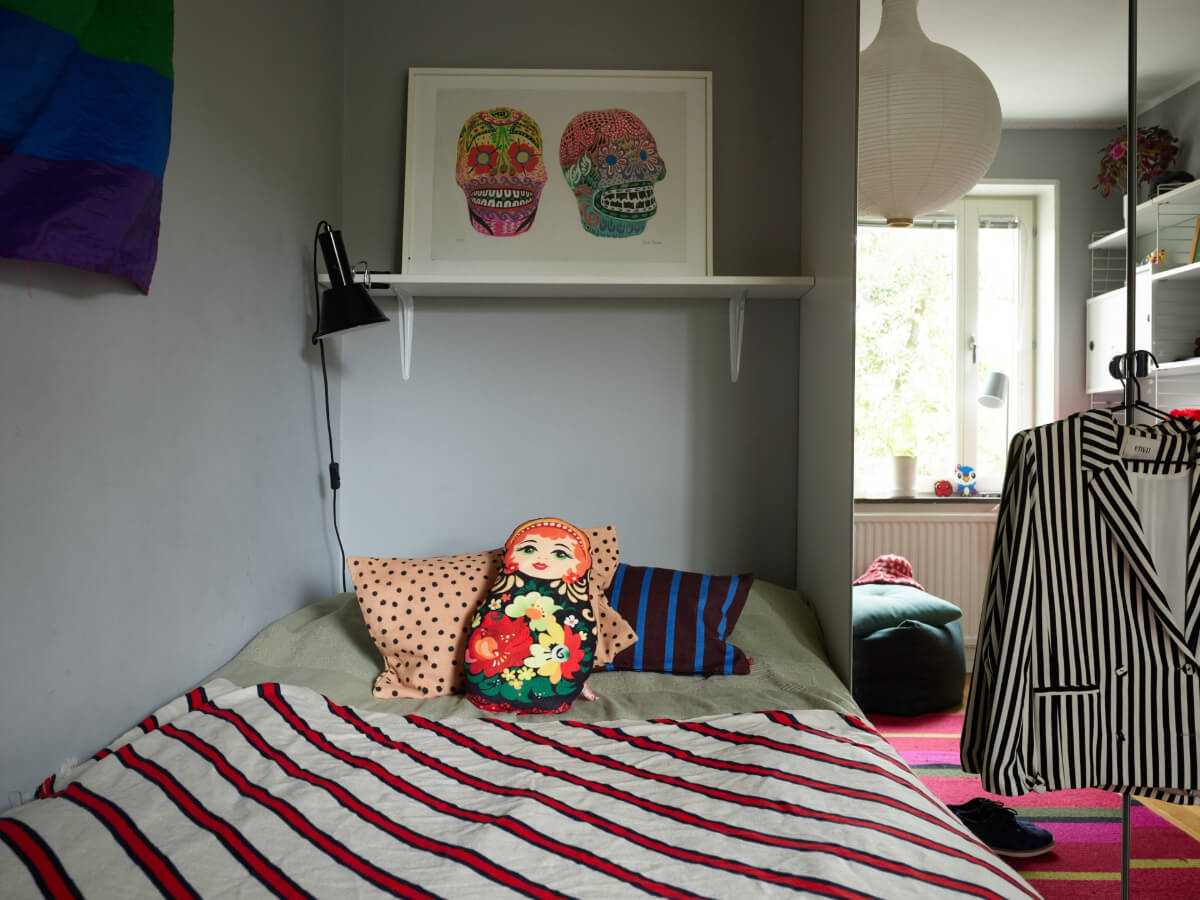 A Lovely Color Palette in a Midcentury Apartment in Sweden 26 gray bedroom wardrobe mirror doors