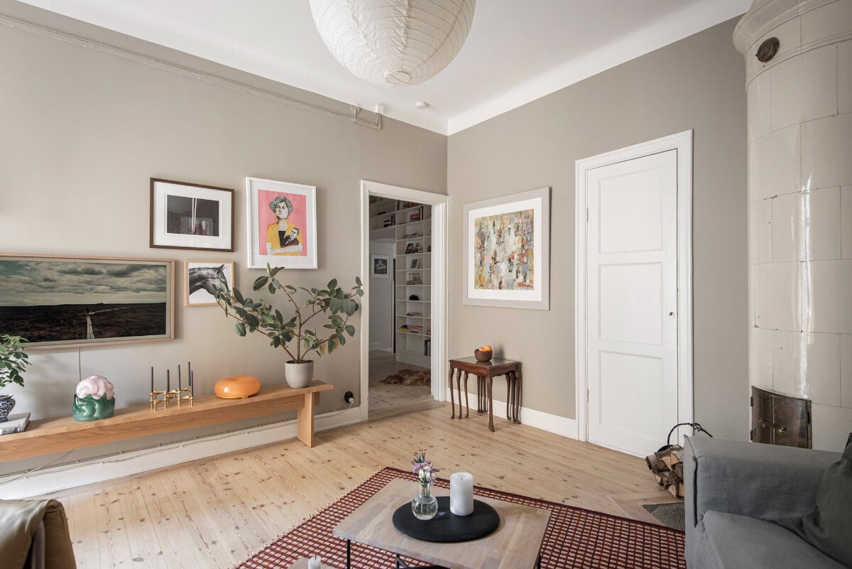 Rooms with Unique Shapes in a Lovely Swedish Apartment 10 gray living room wooden floor